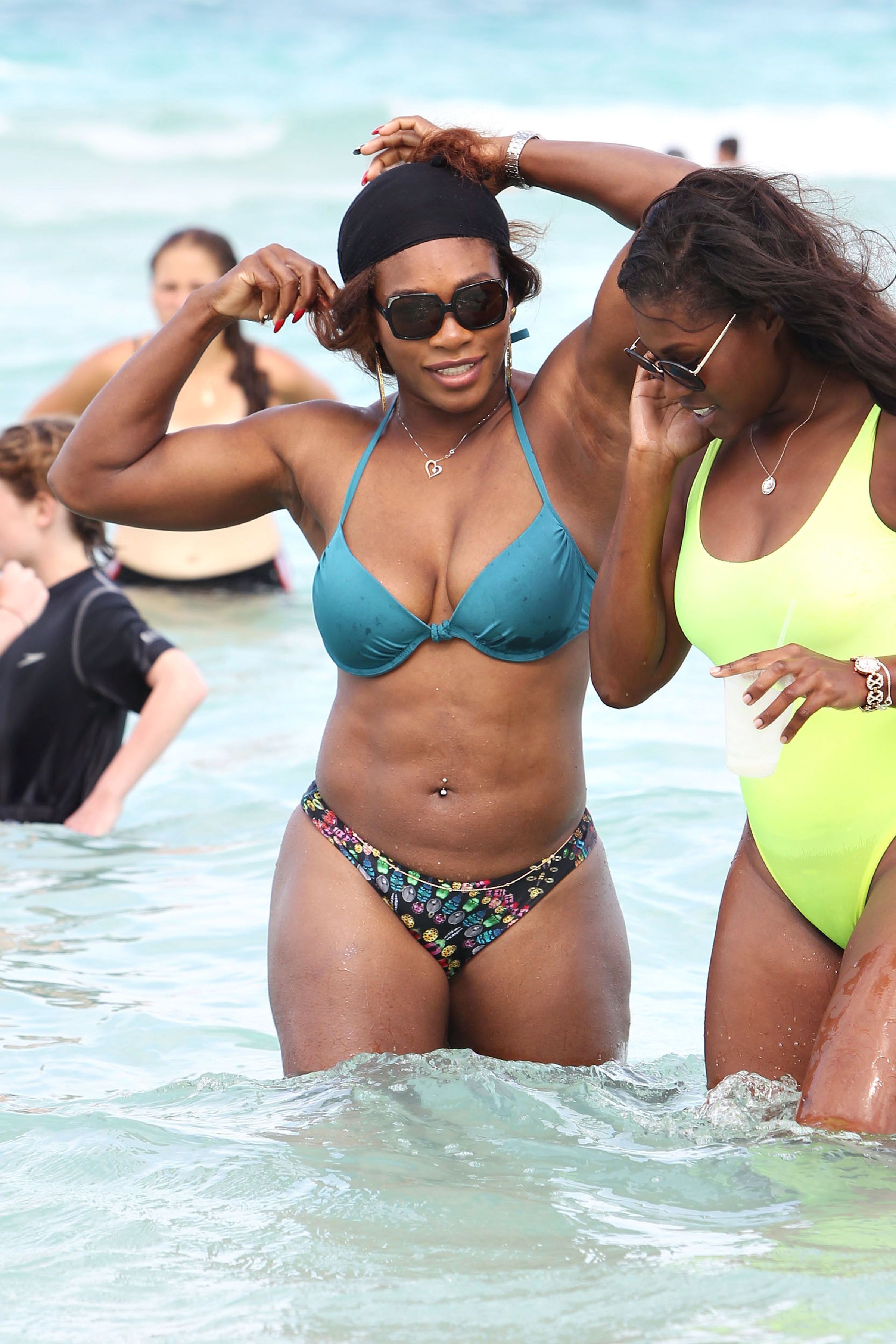 116791, Serena Williams shows off her fit body as she takes a dip in the ocean with a friend on Miami Beach. Miami, Florida - Wednesday April 16, 2014. Photograph: Brett Kaffee/Thibault Monnier, © PacificCoastNews. Los Angeles Office: +1 310.822.0419 London Office: +44 208.090.4079 sales@pacificcoastnews.com FEE MUST BE AGREED PRIOR TO USAGE
