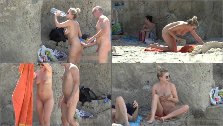 Girl sips a cold one at the beach