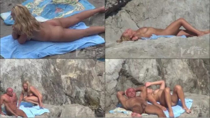 Stones on a naked beach woman
