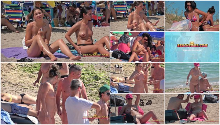 Shiny body of hot nudist woman on beach