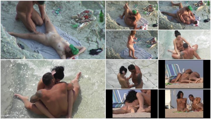 Couple has sex on a beach