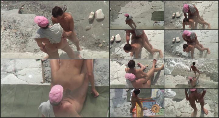 Couple cuddling on the beach