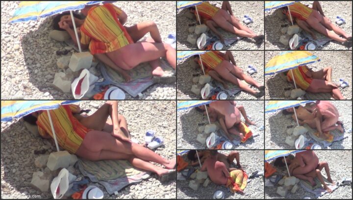 A very horny couple on the beach