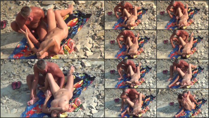 Sensual massage on the nudist beach