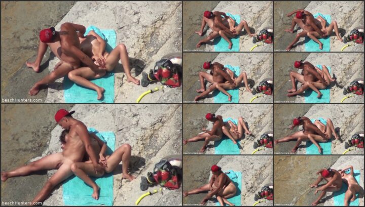 Pussy fingering caught on the beach